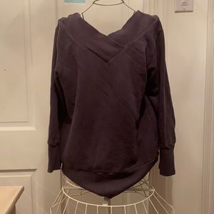 Gray sweater. V neck.